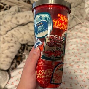 Dutch Bros Red Tumbler with Vibrant Stickers